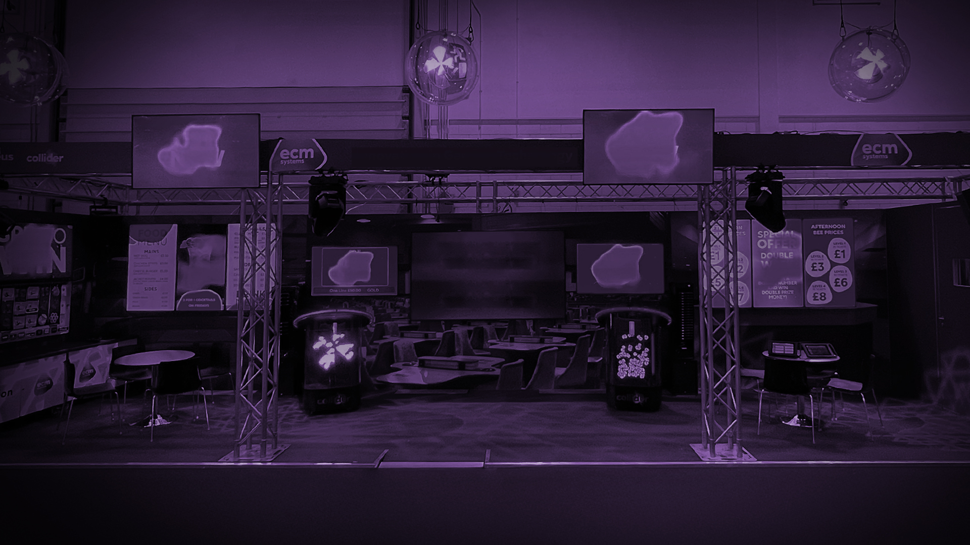 Image of a bingo club showing various tv screens used for advertising and display retail bingo game information
